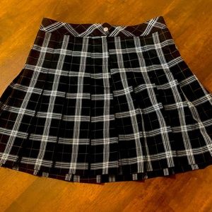 H&M ‘Divided’ brand black plaid pleated mini.
